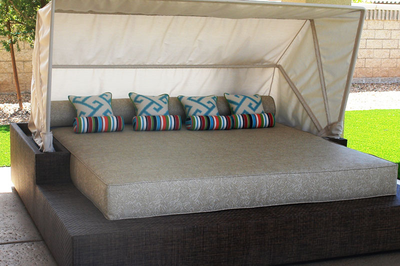 luxurious poolside bed with canopy